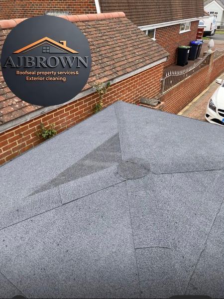 Completed grey felt flat roof with new lead flashing